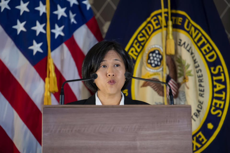 US Trade Representative Katherine Tai speaks during a discussion, at the Geneva Graduate Institute on the role of the World Trade Organization (WTO) in the global economy, in Geneva, Switzerland, Thursday, Oct. 14, 2021. A top U.S. trade official says the Biden administration remains committed to an easing of rules that protect the technology behind coronavirus vaccines so that they can be produced more widely. Katherine Tai, the U.S. trade representative, acknowledged some nongovernmental groups and others outside the talks might perceive the U.S. to have maintained “silence” on the issue in recent months. (Martial Trezzini/Keystone via AP)