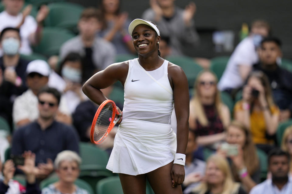 Sloane Stephens of the US celebrates winning the women's singles match against Czech Republic's Petra Kvitova on day one of the Wimbledon Tennis Championships in London, Monday June 28, 2021. (AP Photo/Kirsty Wigglesworth)