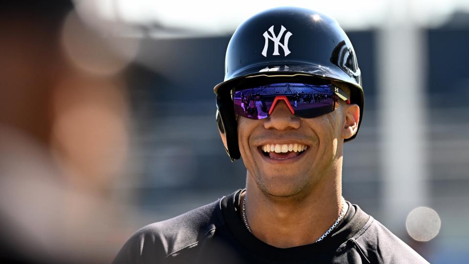 Feb 20, 2024; Tampa, FL, USA; New York Yankees outfielder Juan Soto (22) laughs after finishing a drill at George M. Steinbrenner Field.