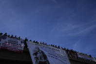 Protesters block the Inter American Highway in Totonicapan, Guatemala, after Indigenous leaders here called for a nationwide strike to pressure Guatemalan President Alejandro Giammattei to resign, early Thursday, July 29, 2021. The protest comes in response to the firing of Special Prosecutor Against Impunity Juan Francisco Sandoval by Attorney General Consuelo Porras. (AP Photo/Moises Castillo)