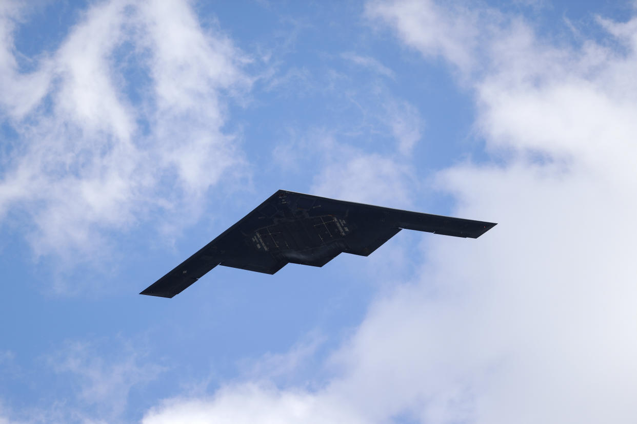 FILE - A B-2 Spirit stealth bomber, assigned to the 509th/131st Bomb Wings out of Whiteman Air Force Base, performs a flyover of Barnes-Jewish Hospital to honor healthcare professionals and essential employees fighting against the coronavirus May 8, 2020, in St. Louis. The Air Force has grounded its entire fleet of B-2 stealth bombers following an emergency landing and fire earlier this month, and none of the strategic aircraft will perform flyovers at this years' college bowl games. (AP Photo/Jeff Roberson, File)