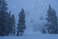 In this image provided by Mammoth Mountain, snow falls at Mammoth Mountain, Friday, Feb. 24, 2023, in Mammoth Lakes, Calif. (Christian Pondella/Mammoth Mountain via AP)