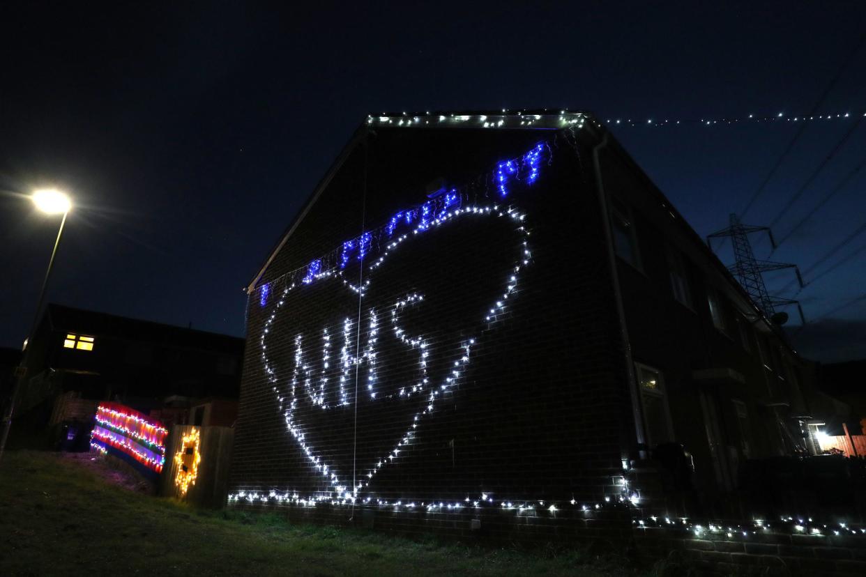 Christmas lights are used to show appreciation for the NHS on a house in Cambridge Drive in Chandler's Ford near Eastleigh, Southampton: PA