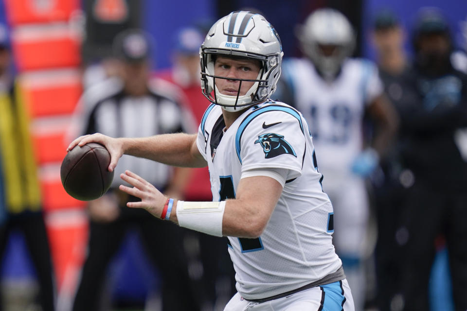 Carolina Panthers quarterback Sam Darnold (14) throws a pass during the first half of an NFL football game against the New York Giants, Sunday, Oct. 24, 2021, in East Rutherford, N.J. (AP Photo/Seth Wenig)