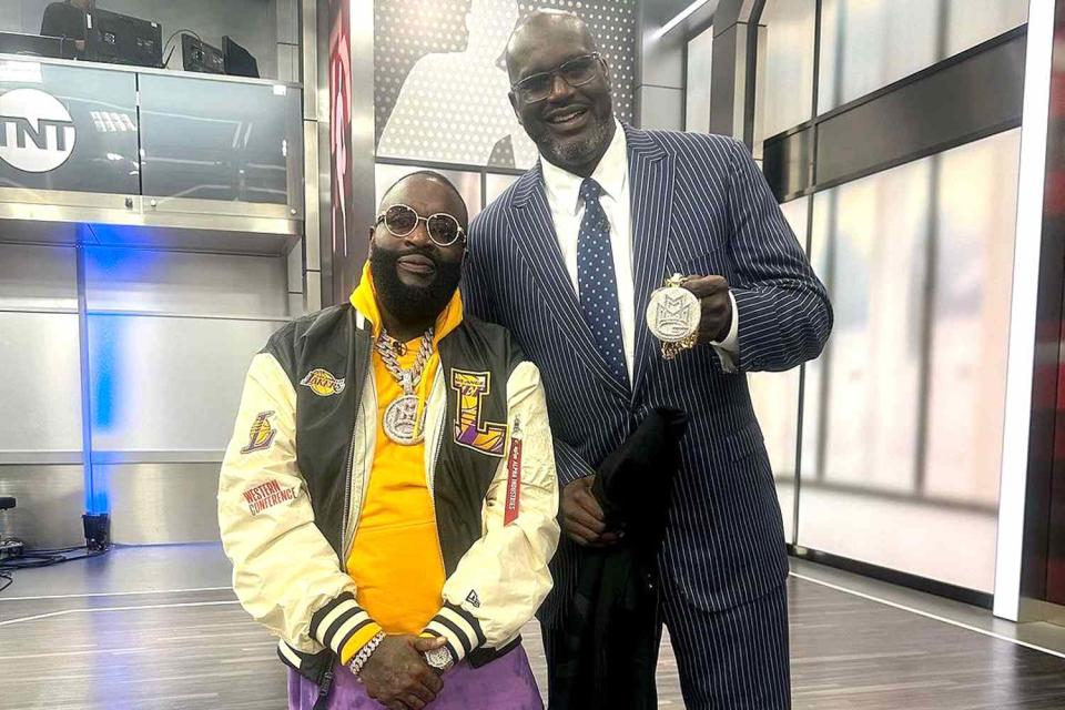 <p>Rick Ross/Instagram</p> Rick Ross poses with Shaq after gifting him an MMG necklace