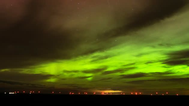 An aurora borealis, also known as the northern lights, is seen in the night sky in the early morning hours of April 24, near Washtucna, Washington.