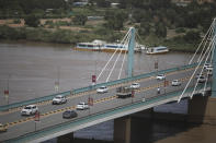 Traffic moves on a bridge in Sudan's capital Khartoum, Tuesday, Sept. 21, 2021. Sudanese authorities reported a coup attempt on Tuesday by a group of soldiers but said the attempt failed and that the military remains in control. The development underscored the fragility of Sudan’s path to democracy, more than two years after the military's overthrow of longtime autocrat Omar al-Bashir amid a public uprising against his three-decade rule. (AP Photo/Marwan Ali)