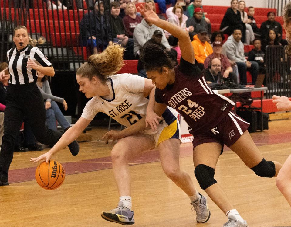St. Rose’s Jada Lynch tries to steal ball from Prep’s GiGi Battle in first half action. Rutgers Prep Girls Basketball vs. St. Rose in NJSIAA Non-Public Sectional finals at Jackson Liberty High School in Jackson NJ on March 4, 2024.