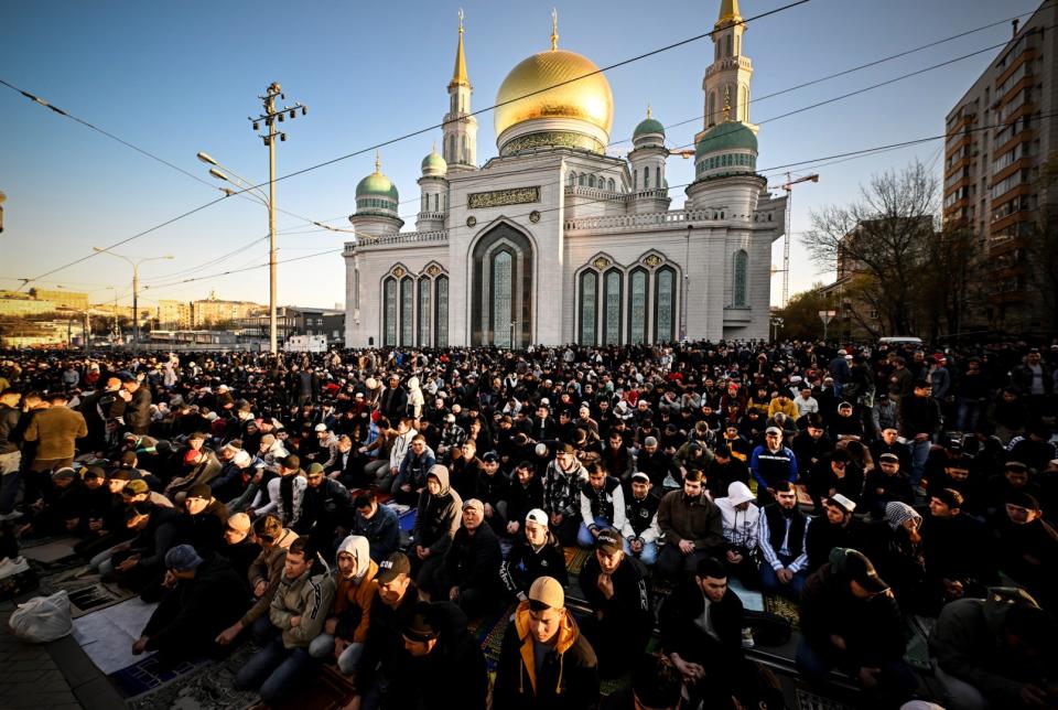 <span>Muslims pray on the first day of Eid al-Fitr, which marks the end of the holy fasting month of Ramadan, outside the Central Mosque in Moscow on April 21, 2023</span><div><span>Alexander NEMENOV</span><span>AFP</span></div>