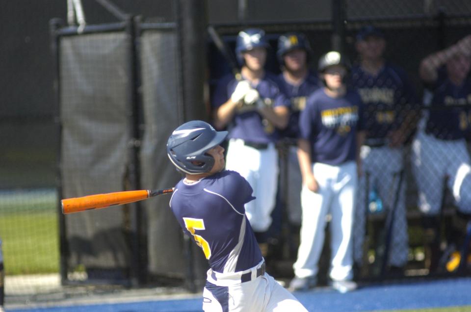 Hillsdale High School's Jack Fickes (5) hits in the first inning during the Div IV Regional baseball final at Gilmour Academy between Hillsdale and Tiffin Calvert Friday June 3,2022 Calvert  defeated the Falcons.  STEVE STOKES/FOR TIMES-GAZETTE.COM