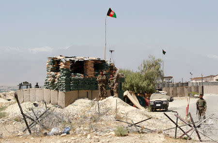 Afghan National Army (ANA) keep watch at a check post in Chaparhar district of Nangarhar province, Afghanistan May 24, 2017. Picture taken on May 24, 2017. REUTERS/Parwiz