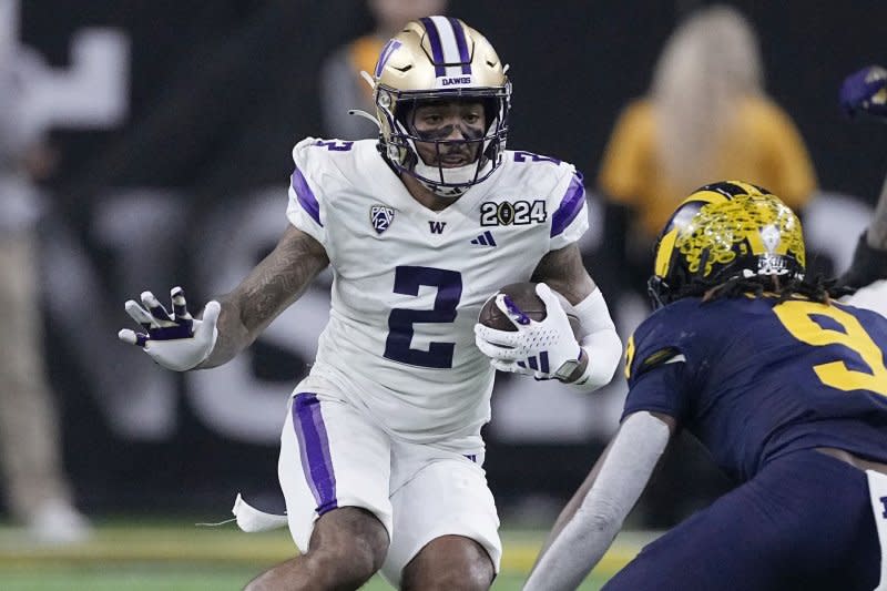 Former Washington Huskies star Ja'Lynn Polk is among the top wide receivers still available for selection in the 2024 NFL Draft. File Photo by Kevin M. Cox/UPI