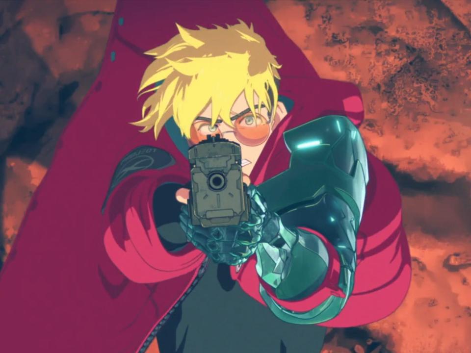 vash the stampede in trigun stampede, a man with blonde floppy hair and tinted glasses focusing intently on aiming a gun towards the sky with both arms