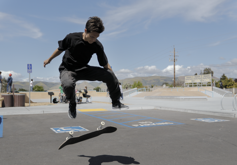 Wyatt Russell lands a kick-flip in the parking lot of the new Nipomo Skate Park located on Tefft Street and Orchard Road on Friday, May 5, 2023.
