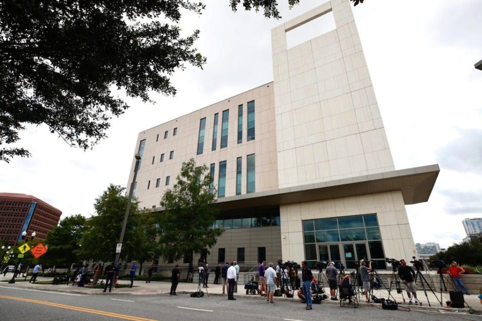 Members of the media stake out the federal courthouse in Orlando on Monday, May 17, 2021. Former Seminole County tax collector Joel Greenberg pleaded guilty to six of 33 charges he's been indicted.