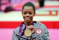 <p>Douglas became the first woman of color to win the women’s all-around final. (Streeter Lecka/Getty Images) </p>