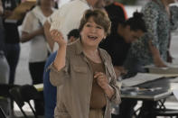 Delfina Gomez, Mexico state gubernatorial candidate for the National Regeneration Movement, or MORENA, prepares to cast her vote at a polling station in Texcoco, Mexico state, Sunday, June 4, 2023. (AP Photo/Eduardo Verdugo)