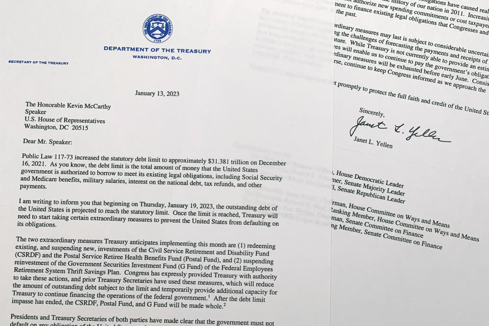 The letter from Treasury Secretary Janet Yellen to House Speaker Kevin McCarthy of Calif., photographed Friday, Jan. 13, 2023, notifying Congress that the U.S. is projected to reach its debt limit on Jan. 19, and will then resort to "extraordinary measures" to avoid default. (AP Photo/Jon Elswick)
