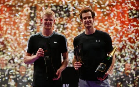  Kyle Edmund of Great Britain (L) poses with the trophy after beating Andy Murray of Great Britain (R) in his Tie Break Tens singles match during day four of the Masters Tennis at the Royal Albert Hall on December 5, 2015 - Credit: Getty images