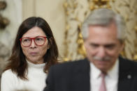 President Alberto Fernandez, right, and new Economy Minister Silvina Batakis smile after Batakis´ swear-in ceremony at the government house in Buenos Aires, Argentina, Monday, July 4, 2022. Batakis will replace Martín Guzmán who quit unexpectedly Saturday, posting a seven-page resignation letter on Twitter. (AP Photo/Natacha Pisarenko)