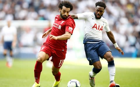 Mohamed Salah of Liverpool and Danny Rose of Tottenham Hotspur battle for the ball during the Premier League match between Tottenham Hotspur and Liverpool FC - Credit: Getty Images