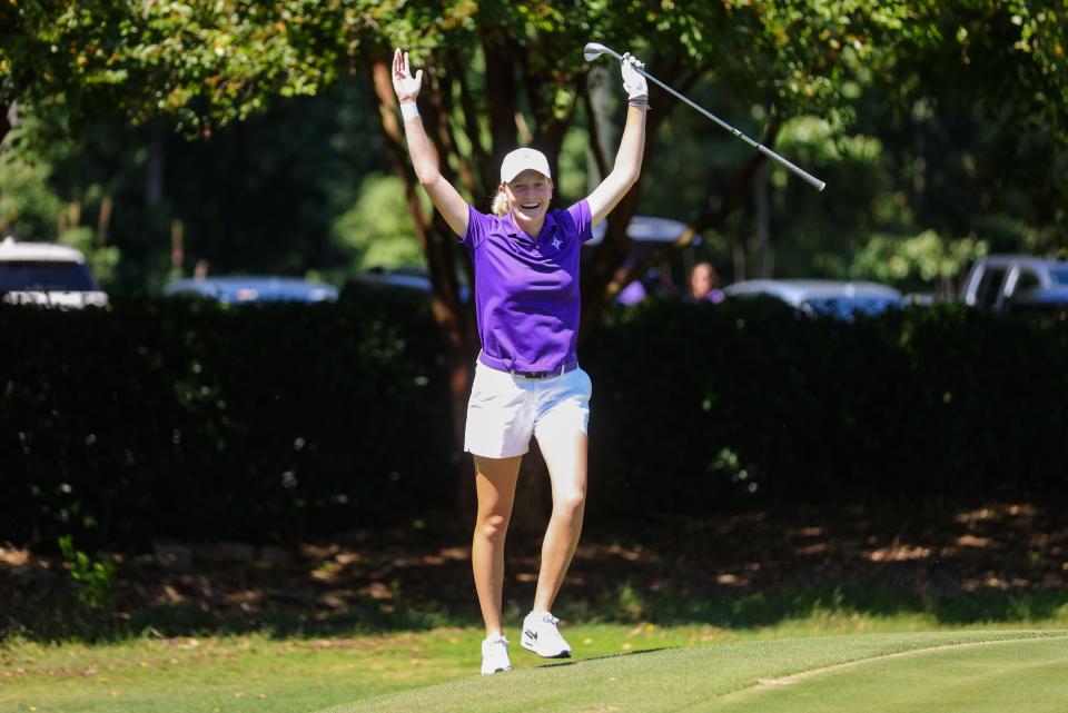 Former Spartanburg and current Furman golfer Anna Morgan celebrating at her first college win last fall. She recently received an invite to play the Augusta National Women's Amateur