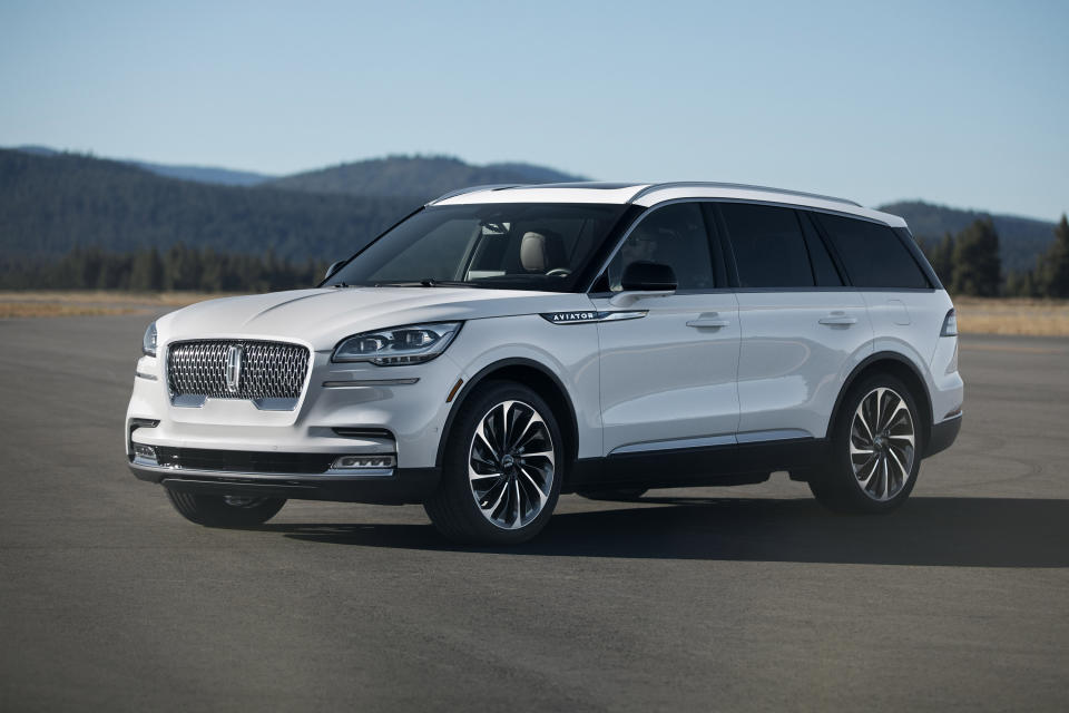 This undated photo provided by the Ford Motor Co. shows the 2020 Lincoln Aviator, a midsize three-row luxury SUV. The Lincoln is all-new, and you'll find plenty of the latest interior technology. One highlight is the 10.1-inch center touchscreen that operates the audio and navigation functions. (Tyler Gourley/Ford Motor Co. via AP)