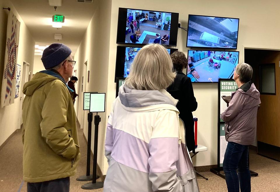 Election observers watch closed circuit cameras set up at various locations Tuesday night, March 5, 2024, at the Shasta County Elections office in downtown Redding.