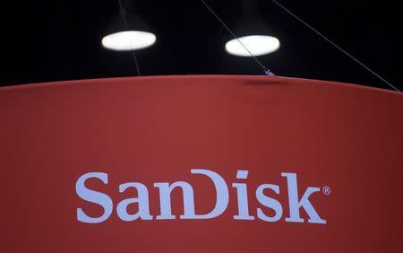 The Sandisk Corporation logo is seen as part of a display at the Microsoft Ignite technology conference in Chicago, Illinois, May 4, 2015. REUTERS/Jim Young