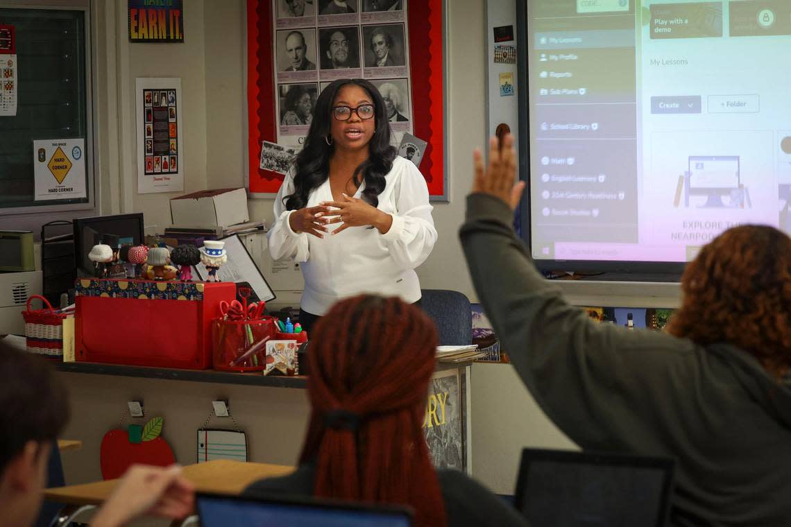 Khristal Gooding teaches history to high school students at Robert Morgan Educational Center on Wednesday, Jan. 25, 2023, in Miami. Gooding is the finalist for the southern part of the district.