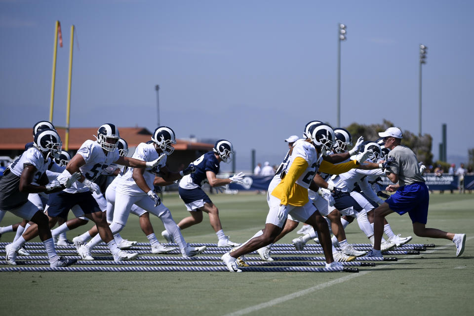 FILE - The Los Angeles Rams special teams participate in drills during an NFL football training camp in Irvine, Calif. Monday, July 29, 2019. For at least one year, Southern California will be a prime spot for NFL training camps. With the Costa Mesa City Council unanimously approving a deal with the Las Vegas Raiders, five teams, the Raiders, Chargers, Rams, Saints and Cowboys, will be holding their practices within a 105-mile radius in late July and early August. (AP Photo/Kelvin Kuo, File)