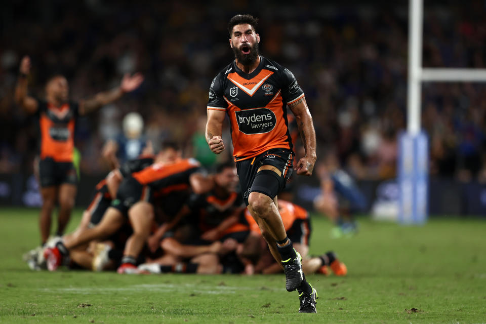 James Tamou (pictured) celebrates a victory.