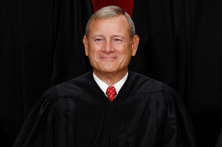 U.S. Supreme Court justices pose for their group portrait at the Supreme Court in Washington