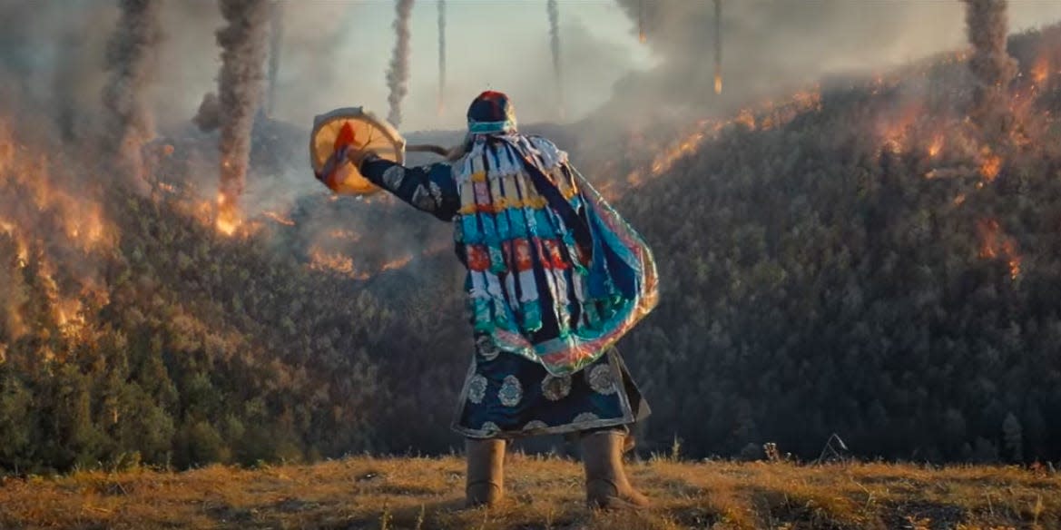 Native American worshiping the sky