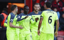 Football Soccer Britain - AFC Bournemouth v Liverpool - Premier League - Vitality Stadium - 4/12/16 Liverpool's Sadio Mane celebrates scoring their first goal with teammates Reuters / Eddie Keogh Livepic EDITORIAL USE ONLY. No use with unauthorized audio, video, data, fixture lists, club/league logos or "live" services. Online in-match use limited to 45 images, no video emulation. No use in betting, games or single club/league/player publications. Please contact your account representative for further details.