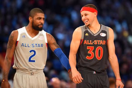 Feb 19, 2017; New Orleans, LA, USA; Eastern Conference forward Kyrie Irving of the Cleveland Cavaliers (2) talks with Western Conference guard Stephen Curry of the Golden State Warriors (30) in the 2017 NBA All-Star Game at Smoothie King Center. Mandatory Credit: Bob Donnan-USA TODAY Sports