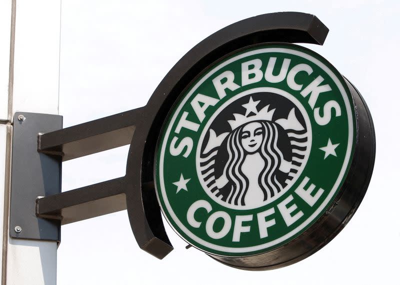 FILE PHOTO: The Starbucks sign is seen outside one of its stores in New York