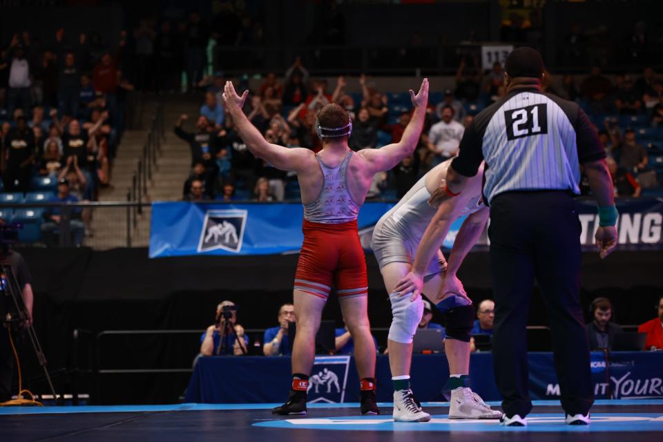 University of Indianapolis' Derek Blubaugh celebrates after winning his first national title, taking the 197-pound division in NCAA Division II Wrestling Championships in Wichita, Kansas on March 16, 2024.