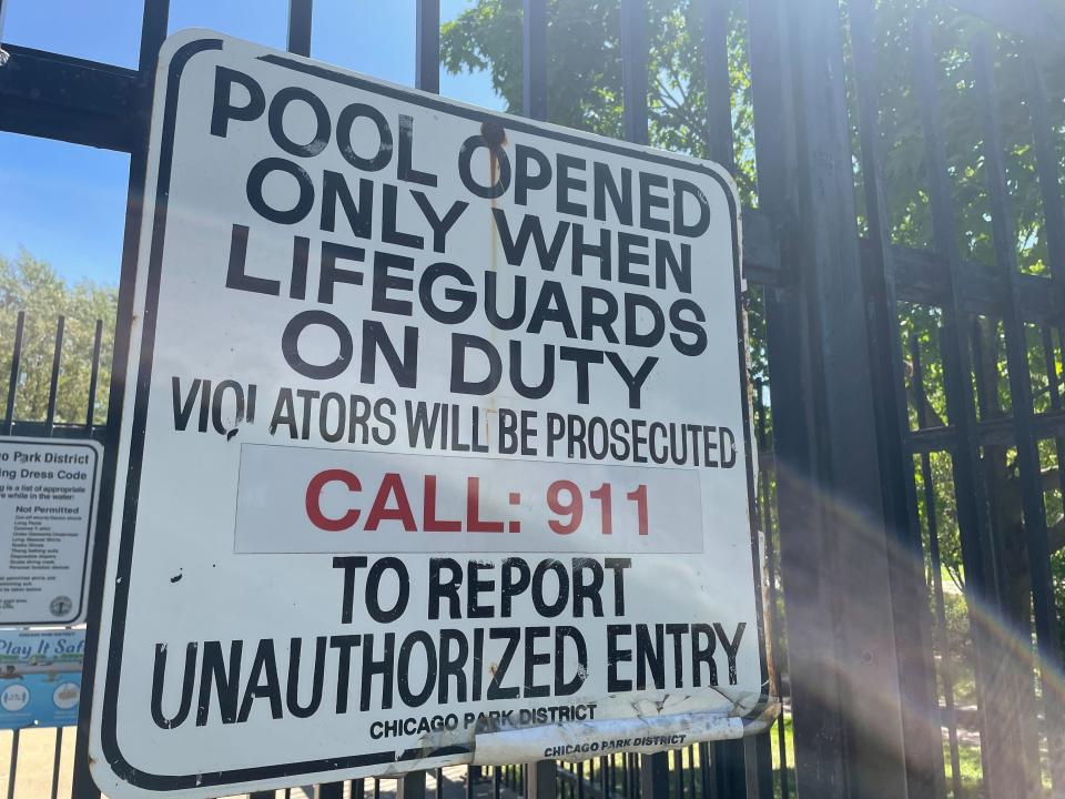 The empty pool at the Wrightwood Park Pool remains closed to swimmers in Chicago, Thursday, June 16, 2022. Chicago's public pools will remain closed until July 5, 2022, according to park superintendent and CEO Rosa Escareño. The city, like the rest of the U.S., is experiencing a critical shortage of lifeguards and is offering $600 retention bonuses to attract new applicants. (AP Photo/Claire Savage)