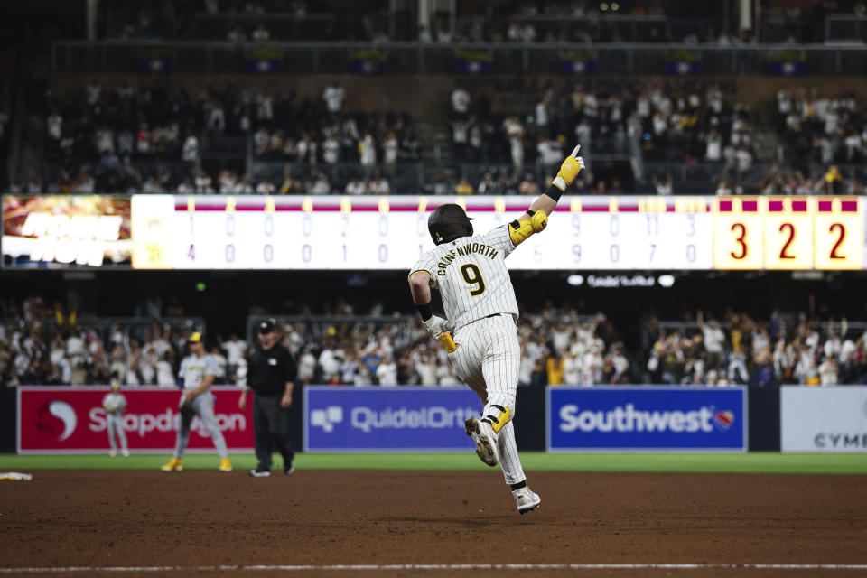 San Diego Padres' Jake Cronenworth celebrates as he runs the bases on a game-winning solo home run against the Milwaukee Brewers during the ninth inning of a baseball game Thursday, June 20, 2024, in San Diego. (AP Photo/Derrick Tuskan)