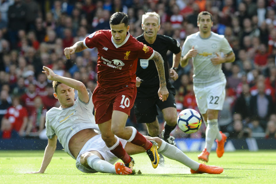 <p>Manchester United’s Nemanja Matic, brings down Liverpool’s Philippe Coutinho</p>