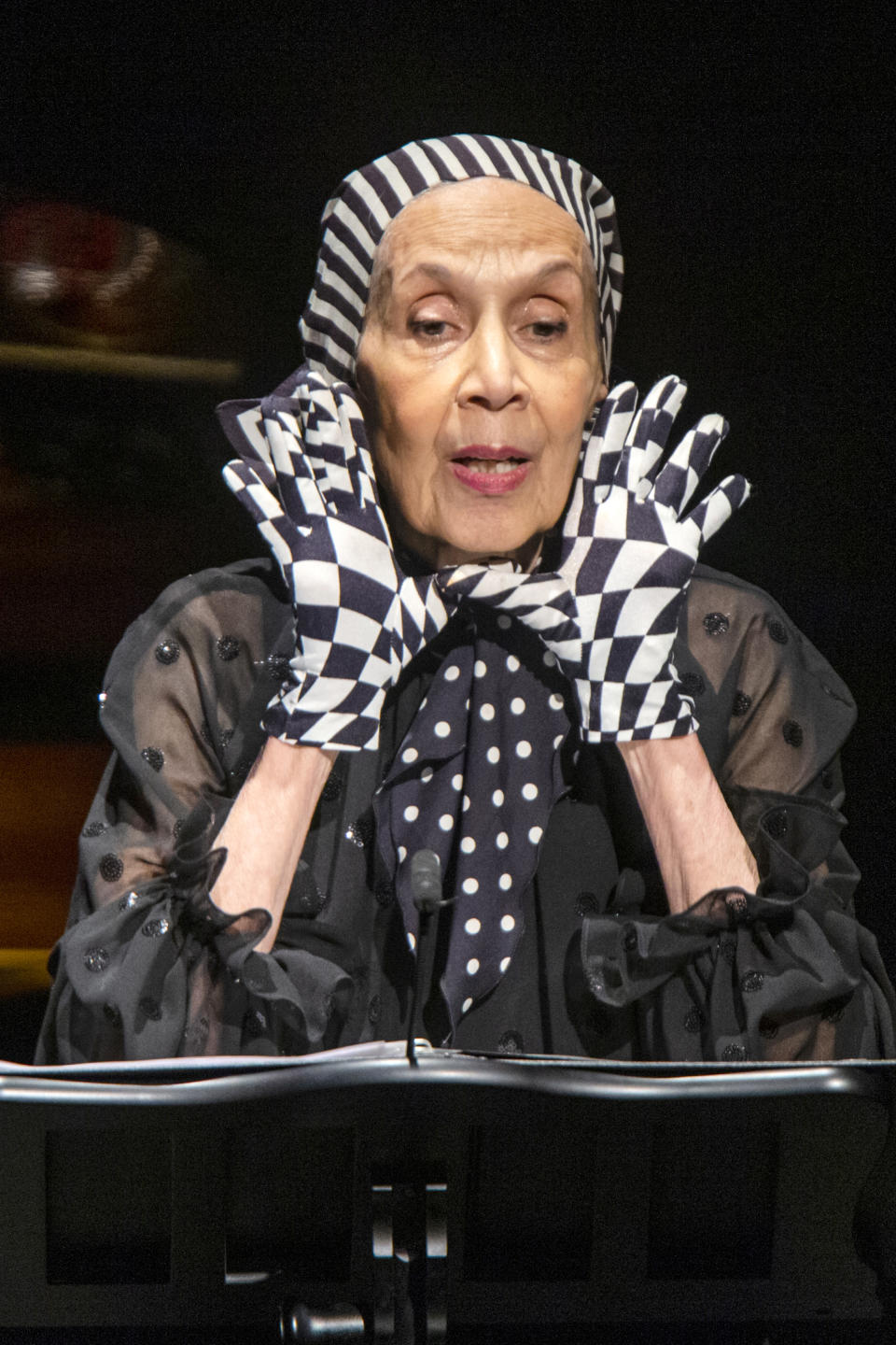 Carmen de Lavallade speaks to attendees during the memorial of late actress Diahann Carroll at the Helen Hayes Theater on Sunday, Nov. 24, 2019 in New York. (AP Photo/Eduardo Munoz Alvarez)