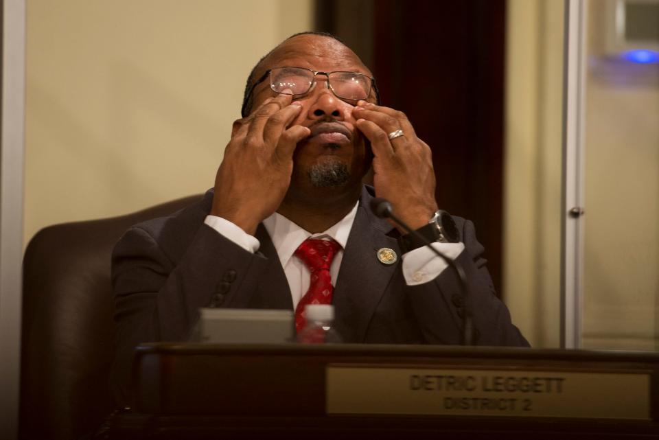 District 2 Alderman Detric Leggett hold his head in his hands as the Savannah City Council discussion on the city's Memorandum of Understanding with the U.S. Attorney's Office drags on at Thursday's City Council meeting.