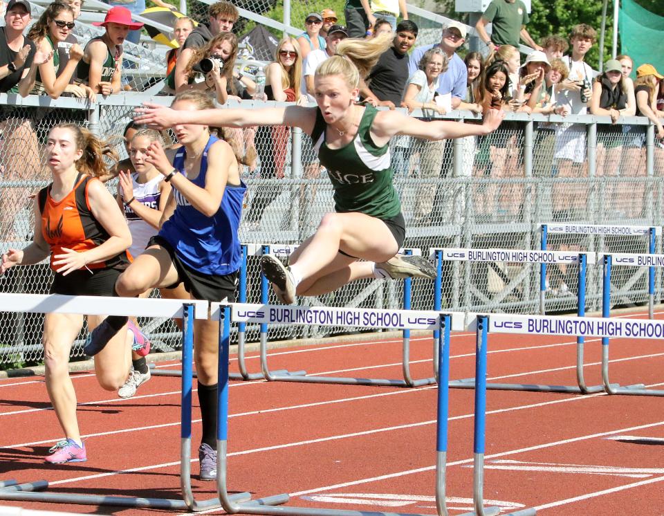 Autumn Carstensen of Rice clears a hurdle on her way to winning the 110 meter race  at the D2 Track & Field State Championships at Burlington High School on Friday afternoon.