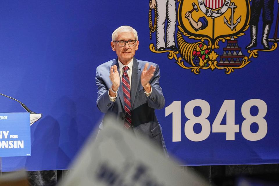 Wisconsin Gov. Tony Evers celebrates victory in Madison on Wednesday.  (Andy Manis / AP)