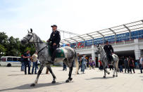 <p>Security on patrol outside the Luzhniki Stadium ahead of the opening match of the 2018 FIFA World Cup </p>