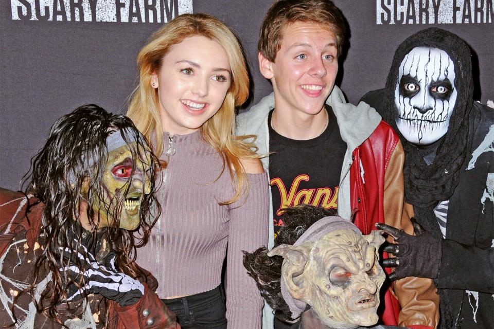 BUENA PARK, CA - SEPTEMBER 30: (L-R) Actress Peyton List and actor Jacob Bertrand attend Knott's Scary Farm black carpet event at Knott's Berry Farm on September 30, 2016 in Buena Park, California. (Photo by Barry King/Getty Images)