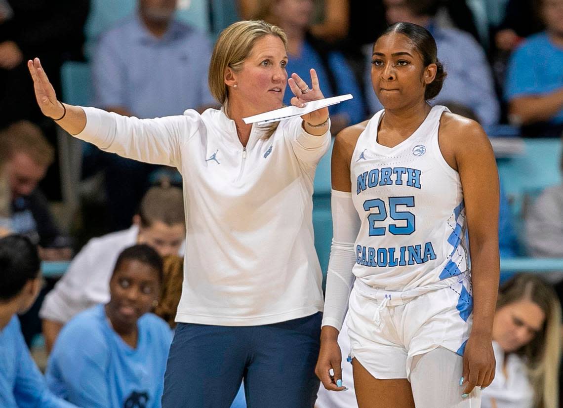 North Carolina coach Courtney Banghart talks with Deja Kelly (25) during their game against Jackson State on Wednesday, November 9, 2022 at Carmichael Arena in Chapel Hill, N.C.