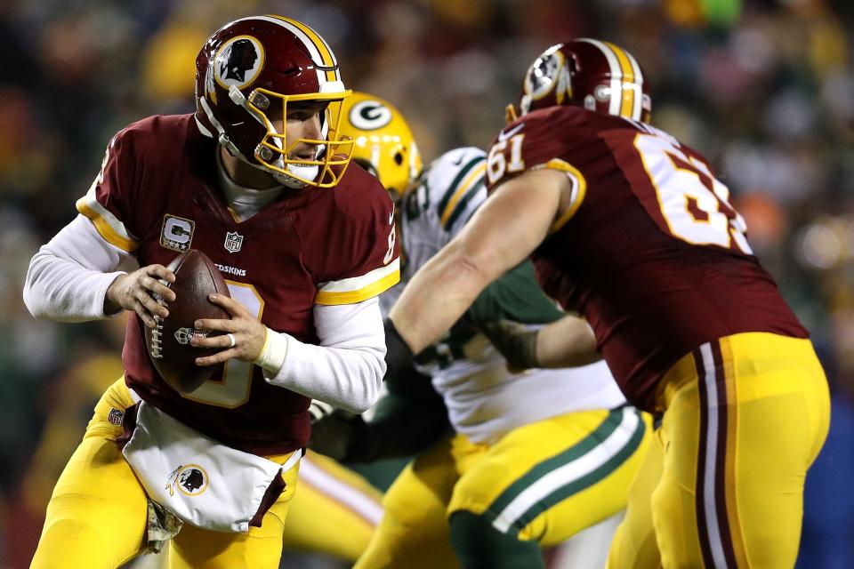 LANDOVER, MD - NOVEMBER 20: Quarterback Kirk Cousins #8 of the Washington Redskins drops back to pass against the Green Bay Packers in the second quarter at FedExField on November 20, 2016 in Landover, Maryland. (Photo by Patrick Smith/Getty Images)