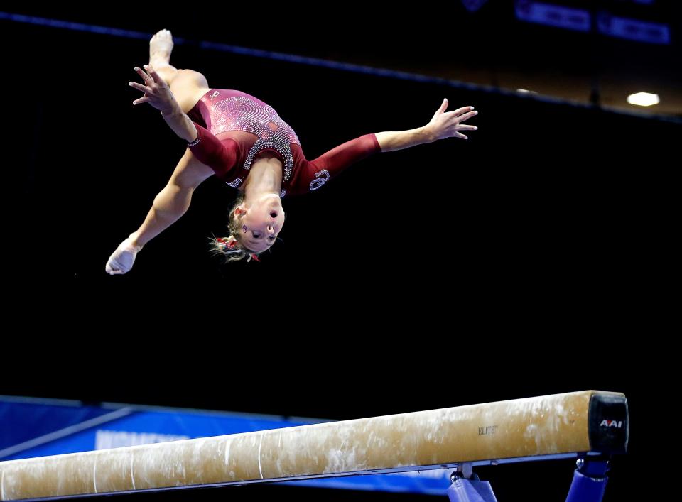 Oklahoma's Audrey Davis competes in the balance beam during the regional of the NCAA Women's National Collegiate Gymnastics Championships  at the Lloyd Noble Center in Norman, Okla., Thursday, March, 31, 2022. 